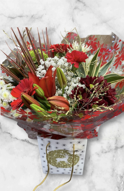 Seasons Greetings - Seasons Greetings is a beautiful watered hand tied available for delivery or collection in Derby and Derbyshire by Beauty of flowers florist