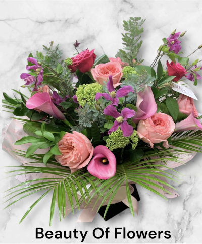 Luxurious Watered Hand Tied flowers in Derby and Derbyshire - This Luxurious Watered Hand Tied needs no explanation. Its is truly beautiful. The use of top quality flowers and foliages makes a stunning display.

Spend Over £40.00 and get a FREE box of chocolates, while stocks last.