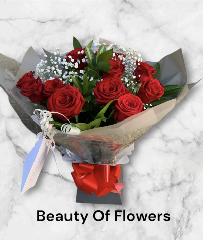 Valentine 12 Red Rose Watered Hand Tied - 12 Red Roses, the perfect gift for your Valentine. Each rose is the best quality, longest stem and plumpest head. Rest assured, we are professional florists, who hand pick and hand make every bouquet, so we will only provide the best available.